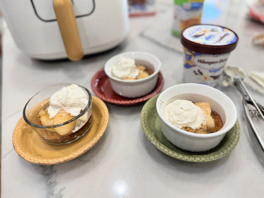2 ingredient apple pies with ice cream on top
