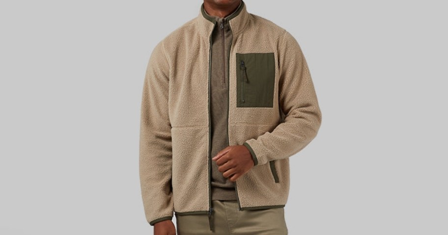 man wearing 32 degrees sherpa in tan and green