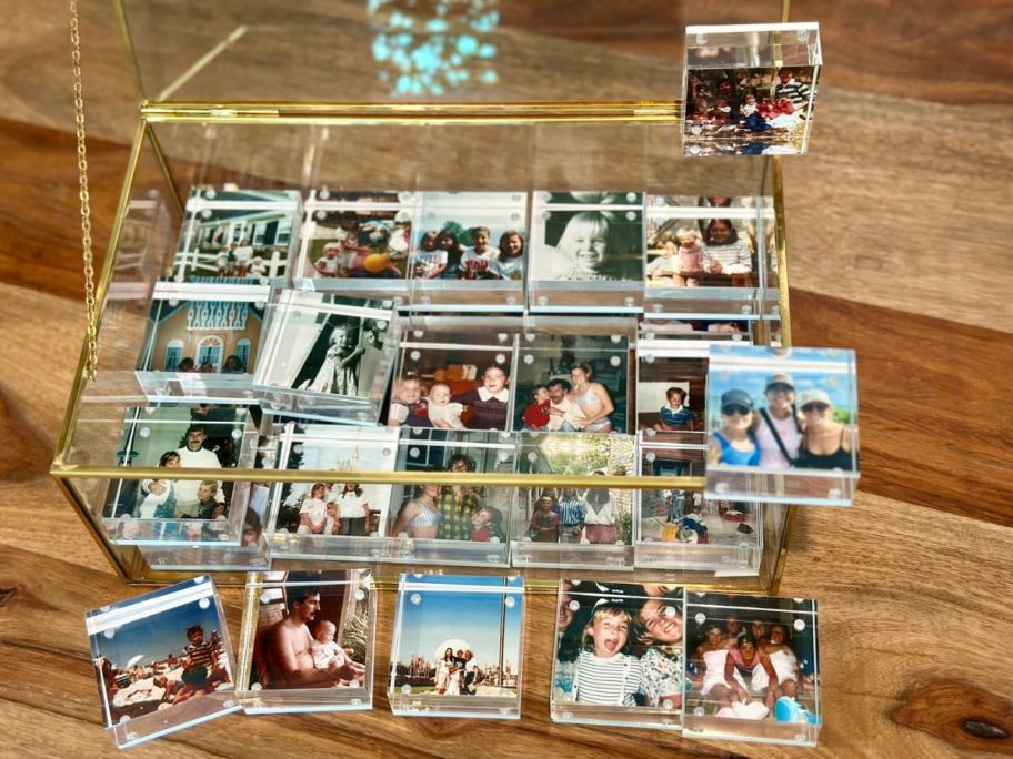 Acrylic photo blocks outside of a box with different images on display