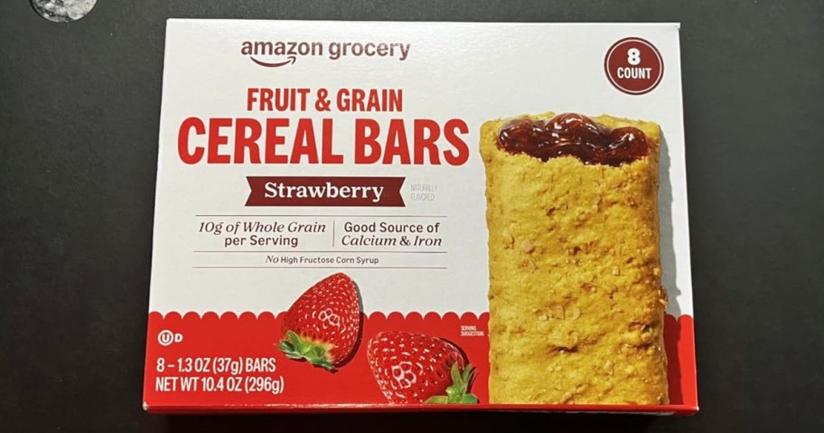 box of Amazon Grocery Cereal Bars on a black cutting board