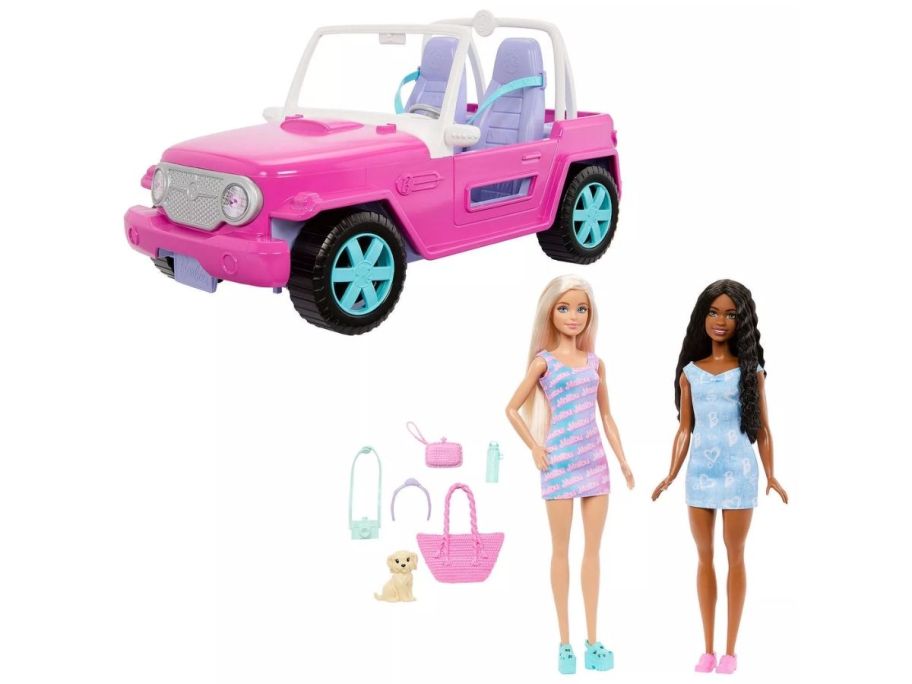 barbie drea, jeep with two dolls and accessories next to it 