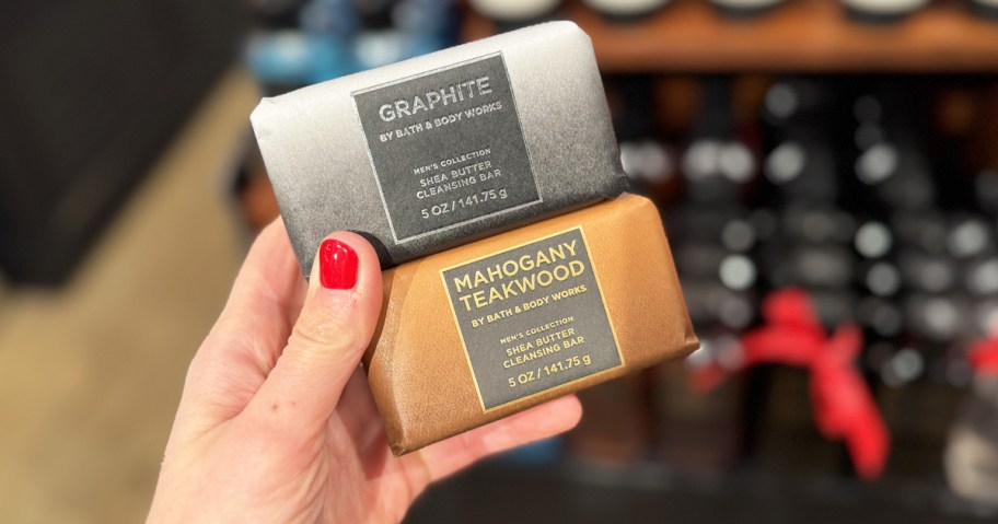 Hold two bath and bodyworks bar soaps in your hand