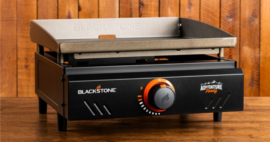 small blackstone griddle on a wood table