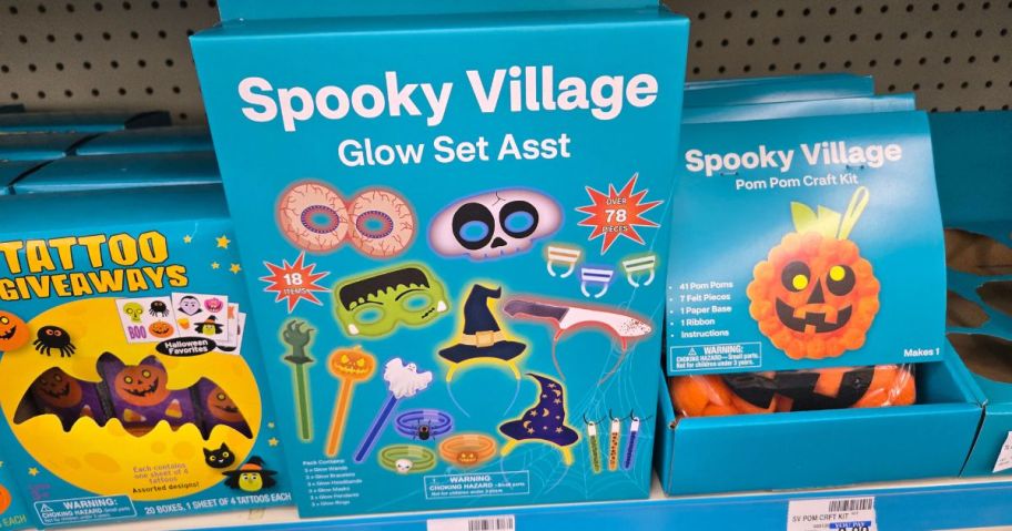 several teal boxes of Halloween crafts