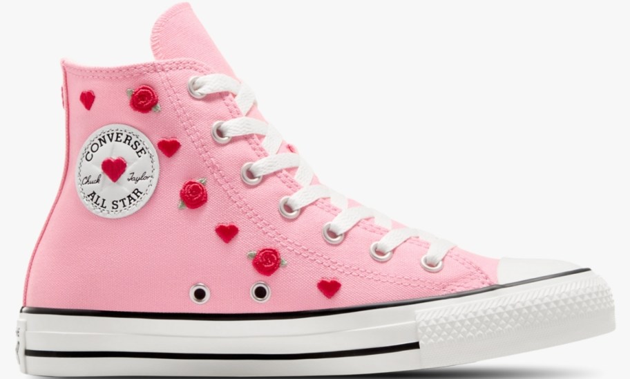 a pink converse hightop sneaker