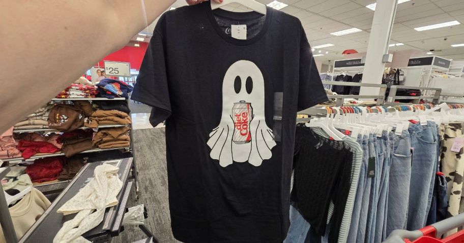 A person holding a Diet Coke Ghost Shirt