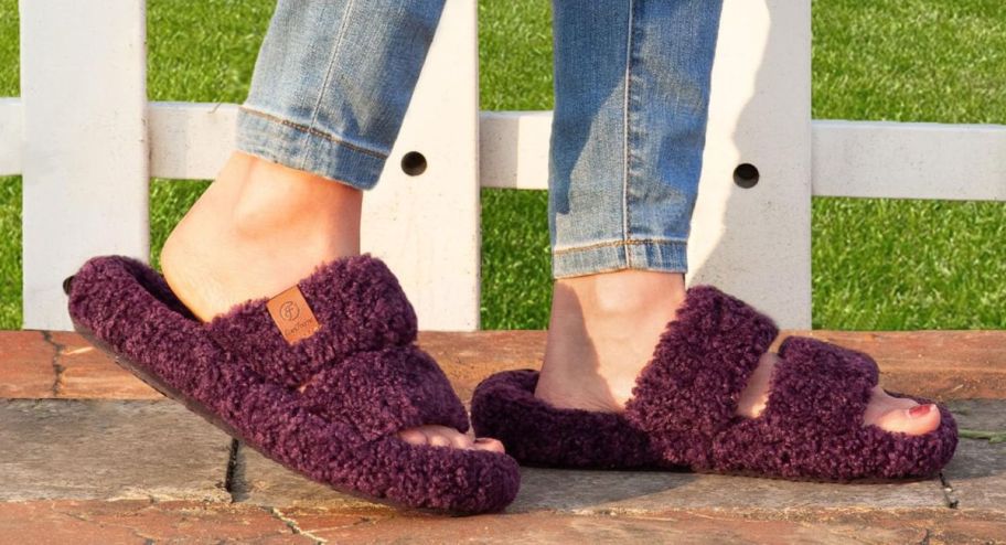 woman wearing EverFoams Women's Fuzzy Open-toe Slippers while walking outside