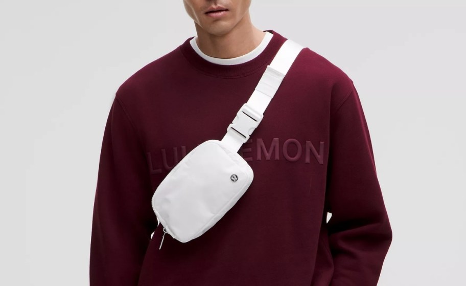 man with a white belt bag