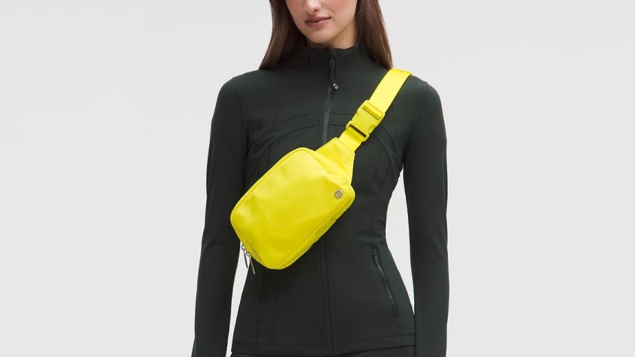 woman with a yellow belt bag