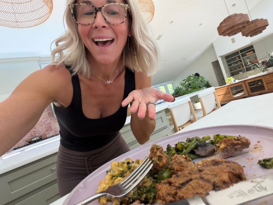 woman with a plate with Factor Meal on it