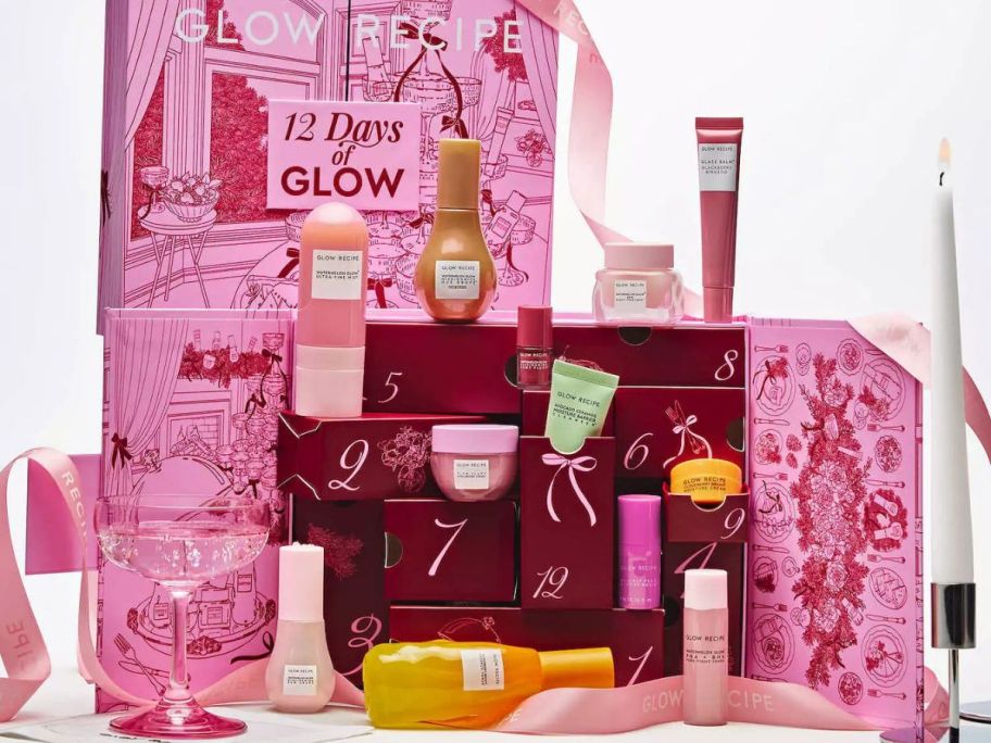 A pink box surrounded by beauty products
