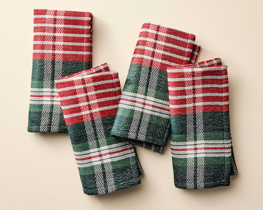 red and green plaid napkins on cream background