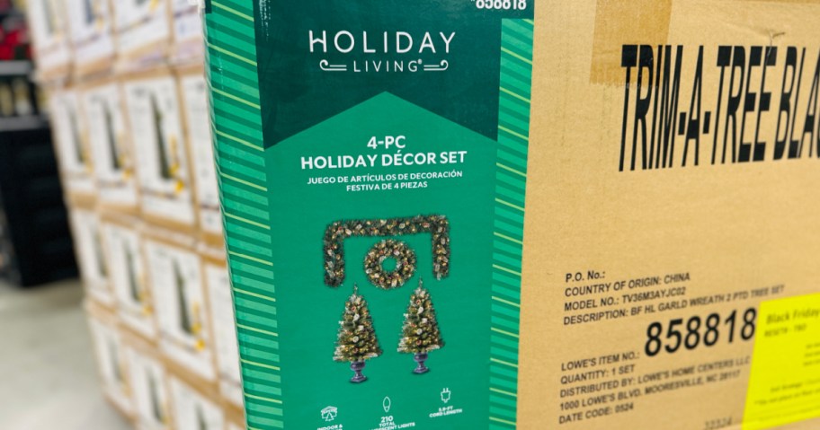 Holiday living four piece Christmas decor set inbox inside Lowe's store