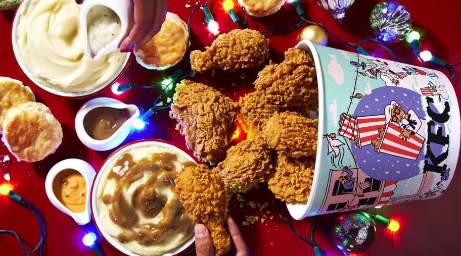 tipped bucket of fried chicken onto a table set for Christmas dinner