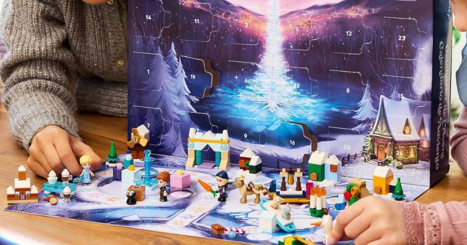 kids playing with the LEGO Frozen Advent Calendar