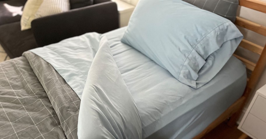 Linens & Hutch Essential Sheet Set on a bed