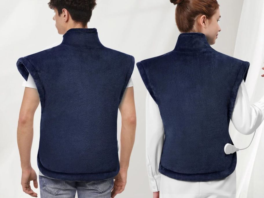 A man and a woman wearing a heating pad vest