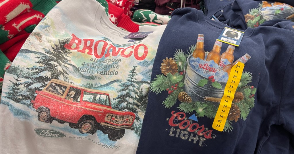 Bronco and Coors light men's holiday sweatshirts inside Sam's Club