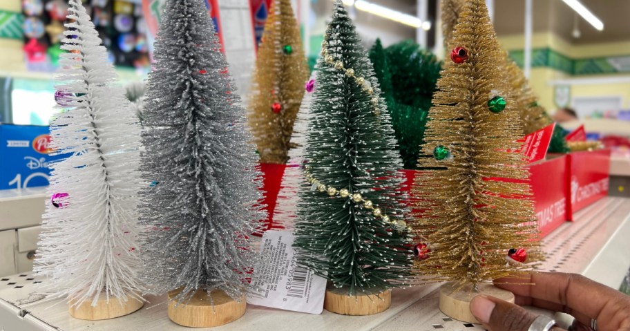 mini Christmas trees on display inside Dollar tree store