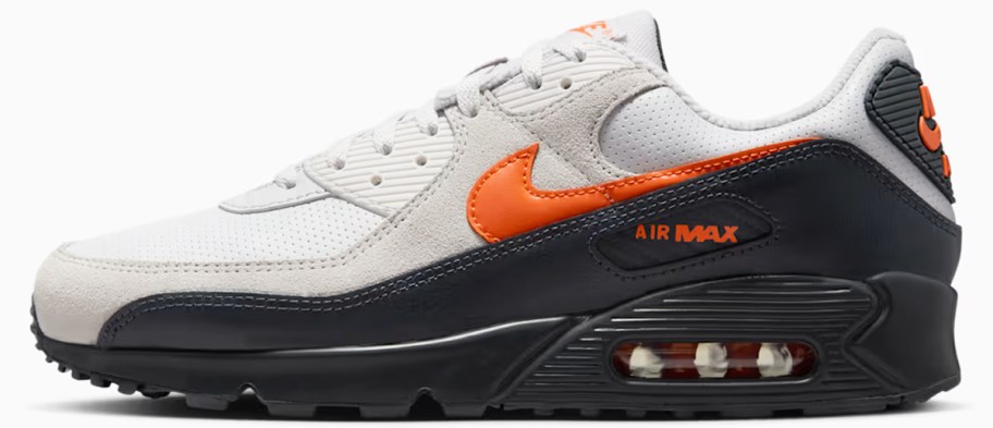 tan, orange, and black nike sneaker