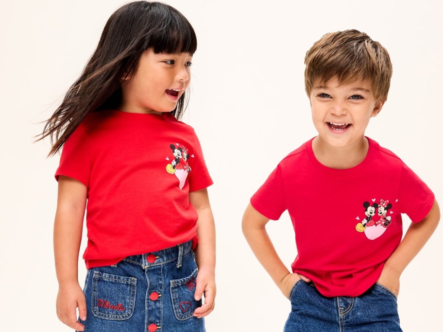 Two kids wearing Old Navy Disney Valentine's Day shirts.