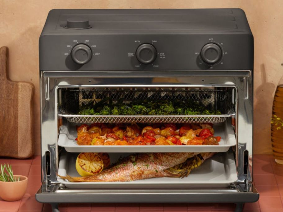 Our Place Large Wonder Oven with food inside in black