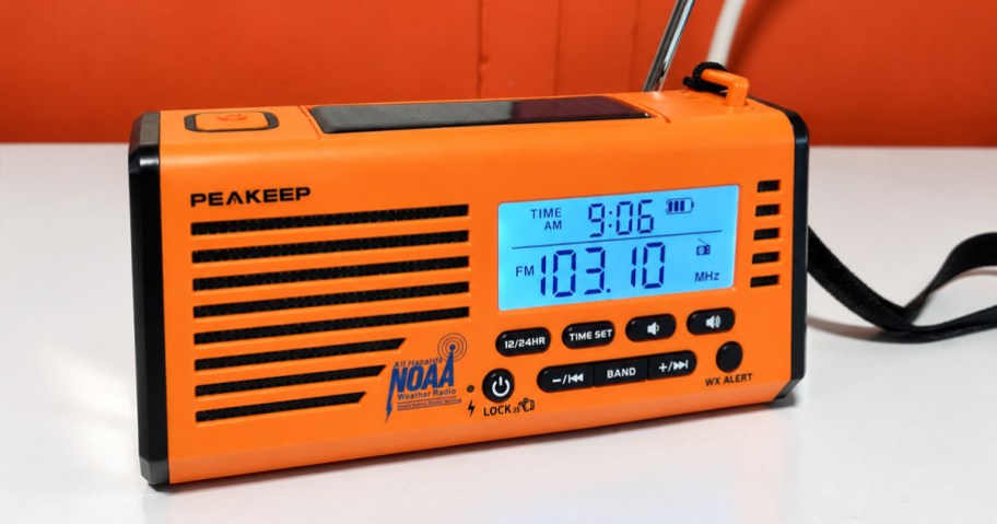 orange radio on a table