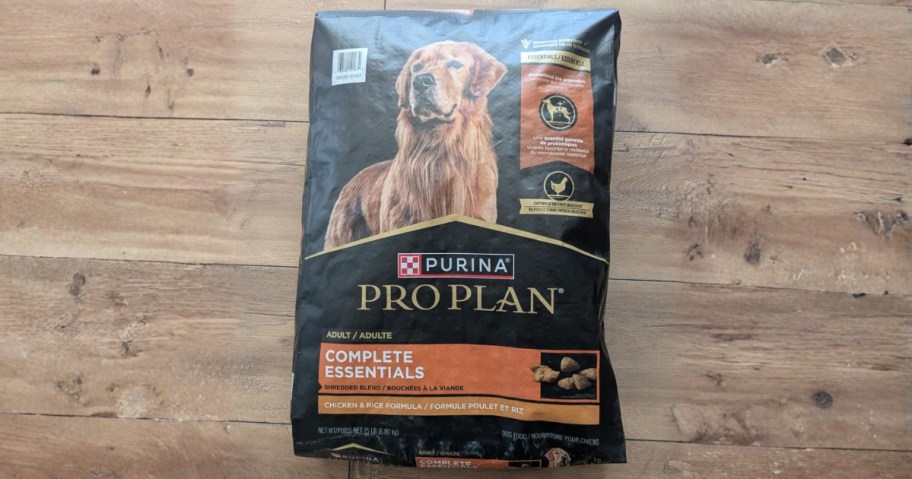 huge bag of purina pro plan complete essentials dog food on floor