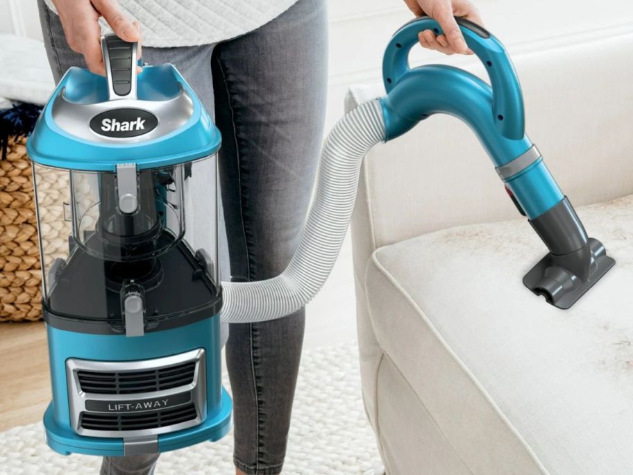 Woman using a Shark Navigator Lifet-Away