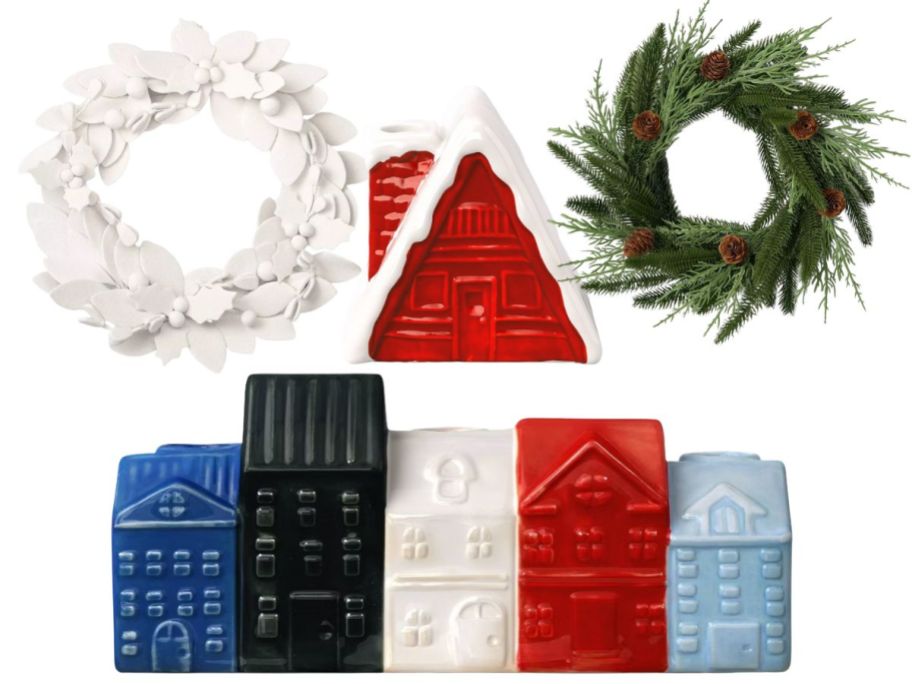 A white wreath, ceramic houses and a green wreath