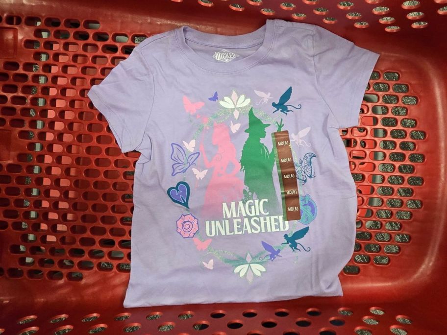 A purple tee shirt in a Target cart