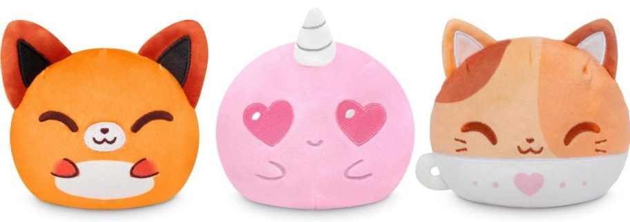 Stock images of 3 TeeTurtle Reversible Plush in fox, narwhal and latte cat