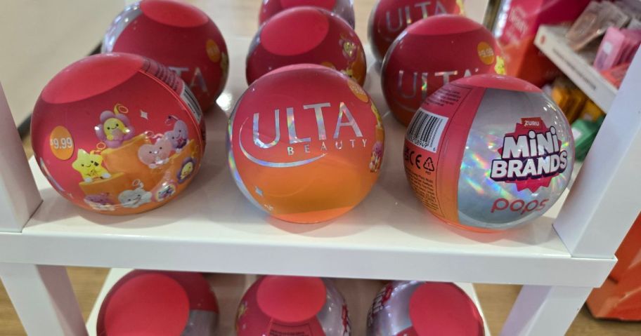 shelf with multiple ulta mini brands balls on it
