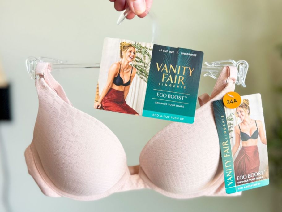 hand holding a brand new vanity fair ego boost bra
