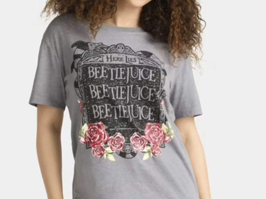 A woman wearing a Beetlejuice Women’s Graphic Tee