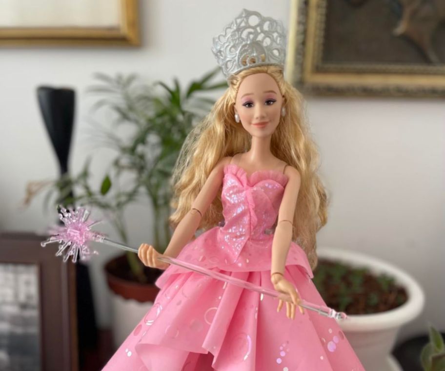 Wicked Deluxe Glinda Fashion Doll on a table