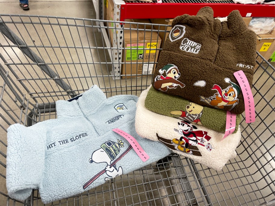 character print sherpa sweatshirts in a shopping cart
