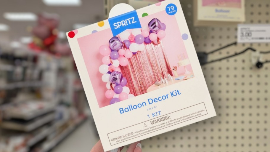 a pink and purple balloon arch kit