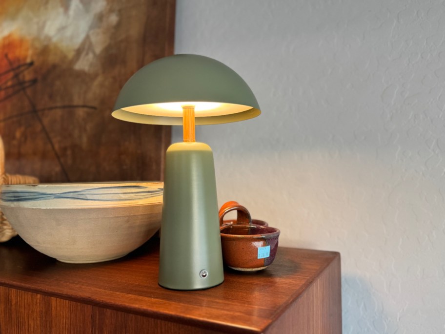 green rechargeable lamp on a table