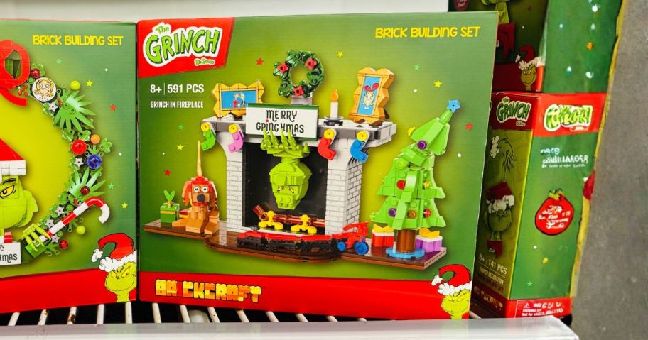 brickcraft grinch sets on shelf in store