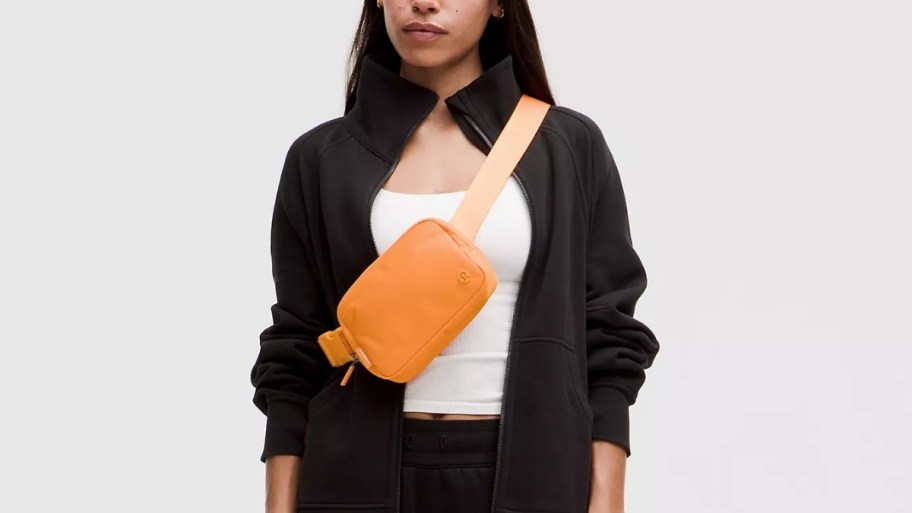 woman with a oraNGE belt bag