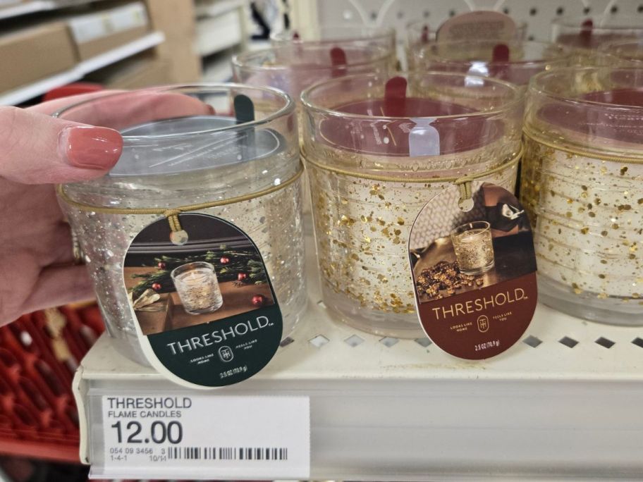 Threshold Flame Candles on shelf in store