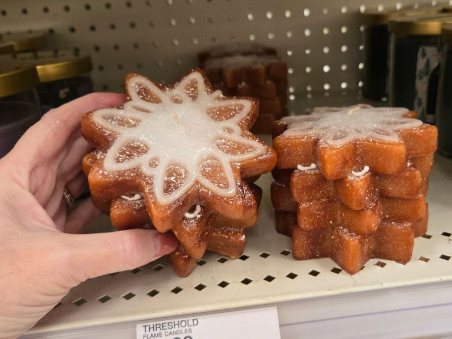 hand holding Threshold Cookie Candle in store