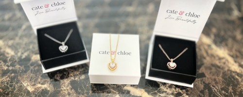 3 cate and chloe necklaces in their gift boxes