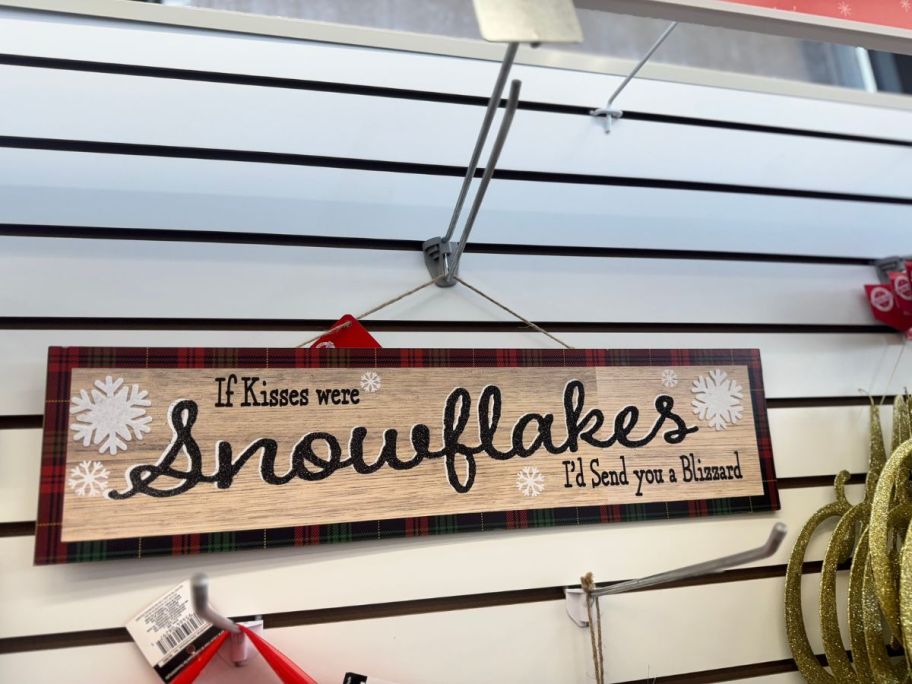 A Christmas sign at Dollar Tree.