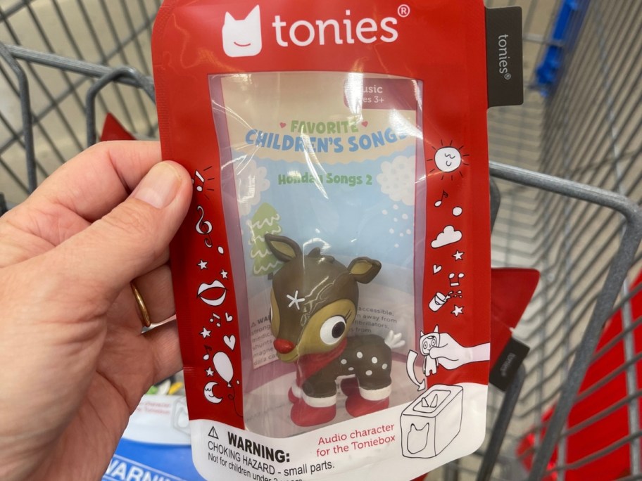 hand holding a package with a Tonies Rudolph the Red-nosed Reindeer