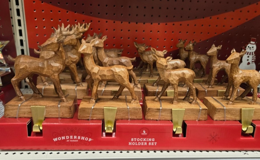 a set of wooder deer family stocking holders