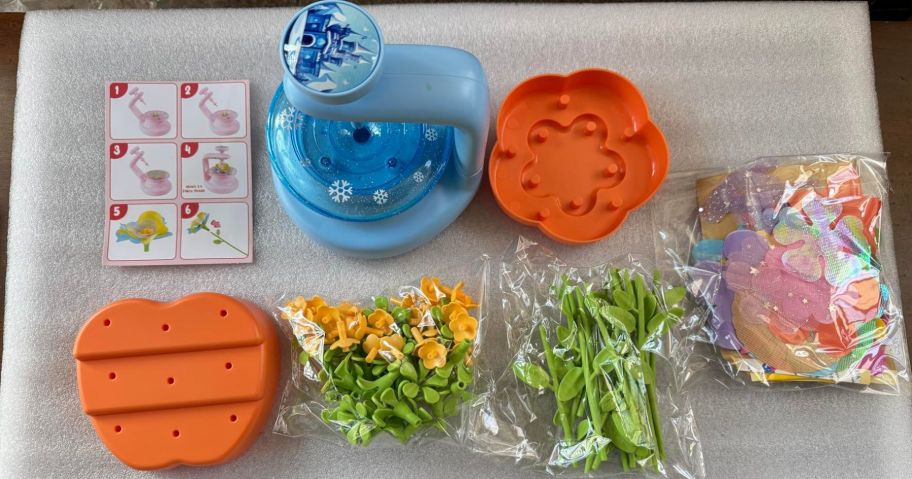 fabric flower maker kit and accessories on table