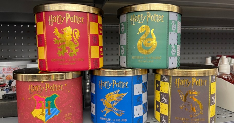 5 Harry Potter themed Goose Creek Candles on a store shelf