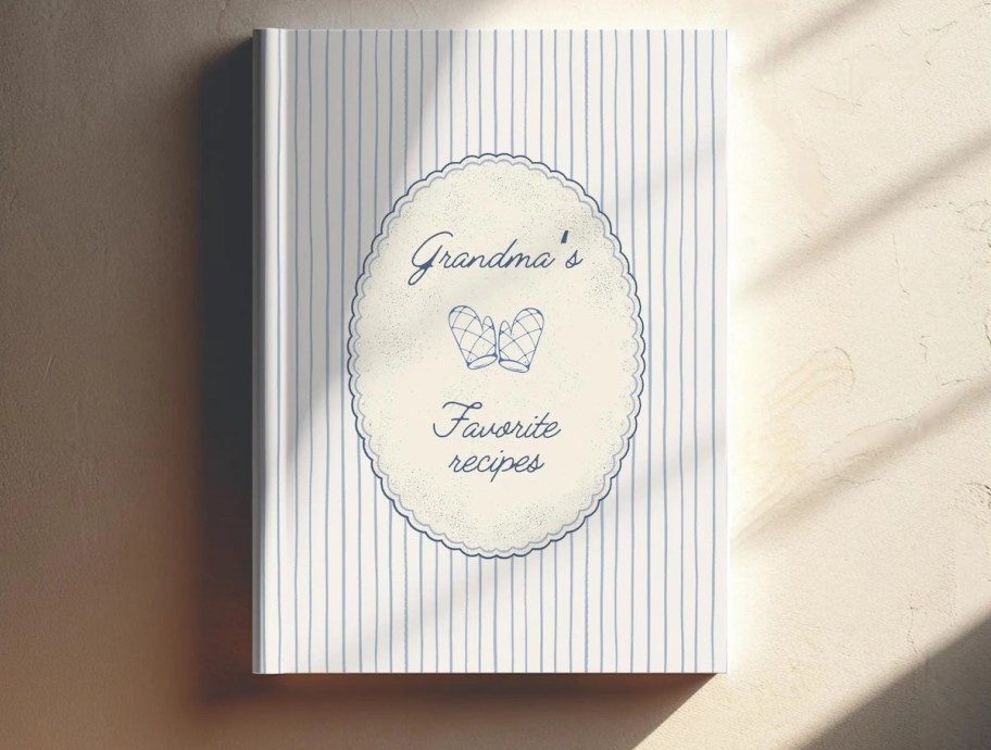 grandmas recipe book with stripes on counter with sunlight
